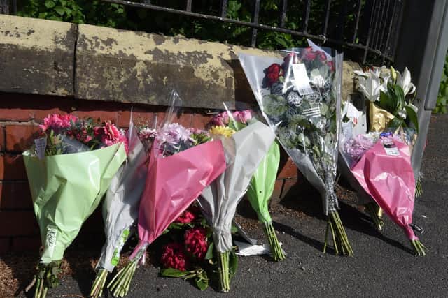 Flowers have been left on Upholland Road
