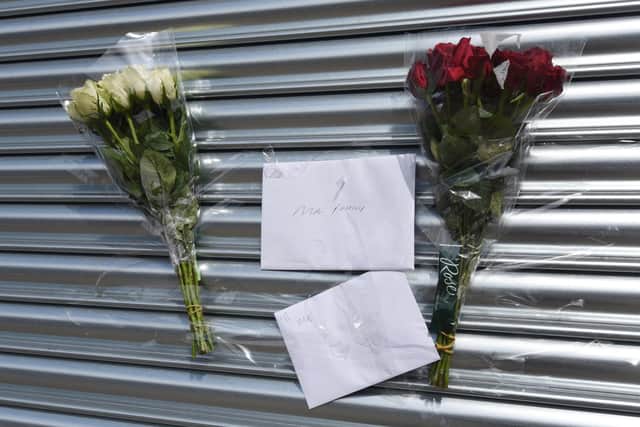 Messages and floral tributes outside The Lash Room which Melissa never saw opened