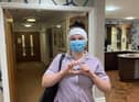 Health worker shows off their headband