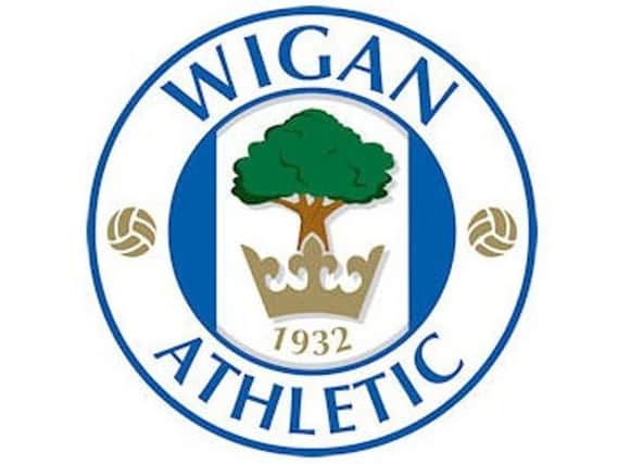 Wigan Athletic's transfer has been given the green light