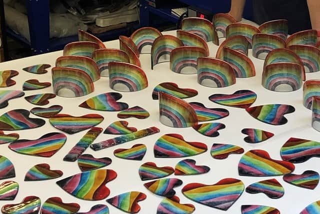 Julie Langan in her workshop at Cedar Farms Galleries, Mawdesley. Julie has raised thousands for Wigan charity The Brick through selling glass rainbows and hearts