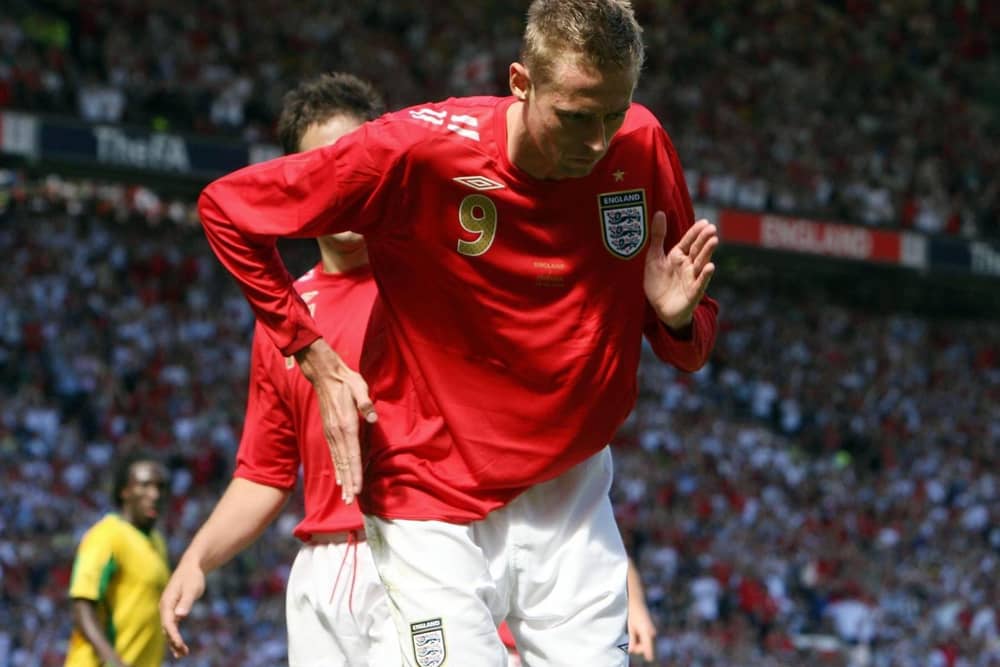 England's Peter Crouch celebrating his second goal during the friendly international against Jamaica at Old Trafford