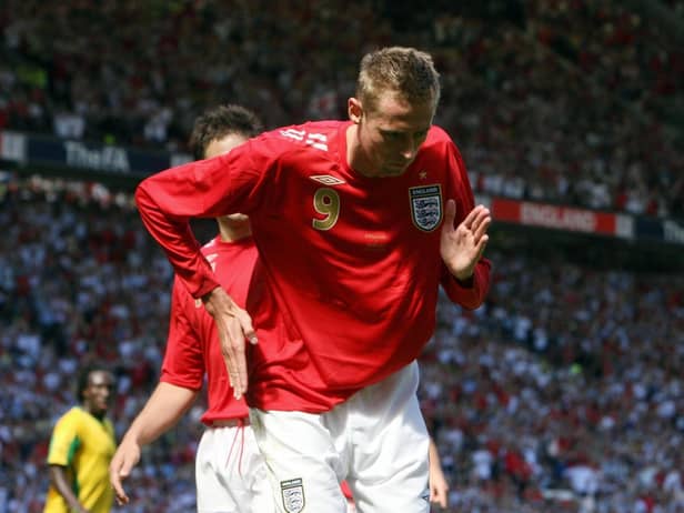 England's Peter Crouch celebrating his second goal during the friendly international against Jamaica at Old Trafford