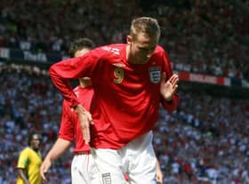 England's Peter Crouch celebrating his second goal during the friendly international against Jamaica at Old Trafford