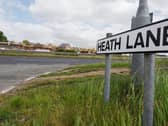 Heath Lane with much house-building going on in the background