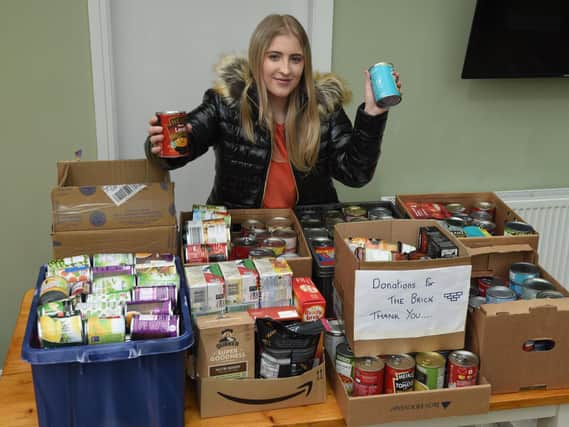 Bryony Reeve with some of the donations for The Brick