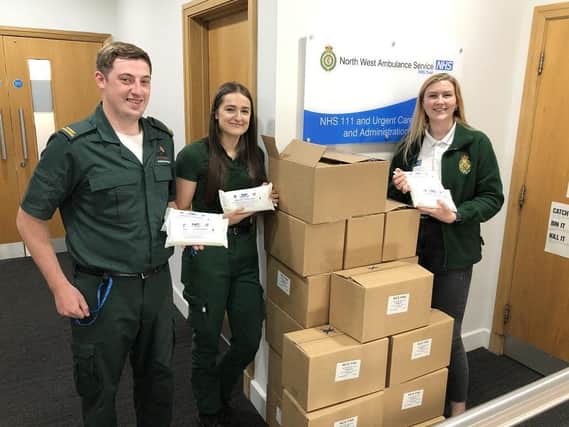 North West Ambulance Service personnel and Halton Haven Hospice take their deliveries