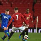 Alfie Devine playing for Latics Under-18s against Manchester United