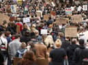 Demonstrators pack into Manchester city centre