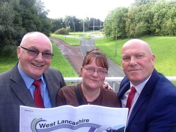 County councillors for the Skelmersdale area looking at the station site entrance