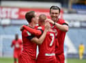 Wigan celebrate victory over Huddersfield