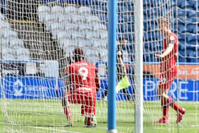 Jamal Lowe celebrates opening the scoring for Wigan