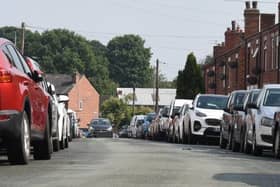 General view of cars parked on Heaton Street, Standish