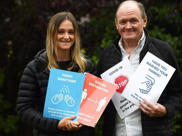 Fiona Hutchings with dad, Barry Hutchings, from Scene Print and Design, who are offering free signage for businesses to help them during the coronavirus pandemic.