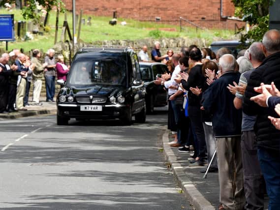 Hundreds of people turned out to pay their last respects to Orrell Rugby Union icon Des Seabrook on Tuesday
