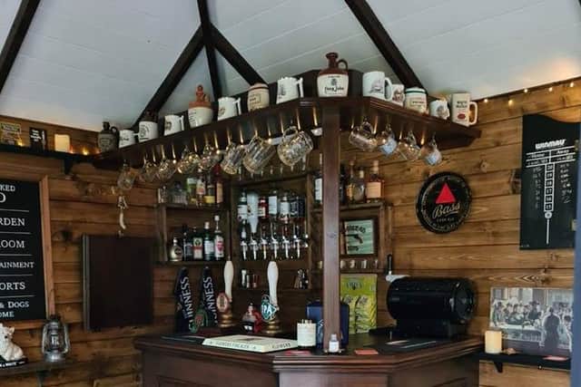 The bar of the mini pub in the Crabtree family garden. Credit: Facebook / Octavia Chic
