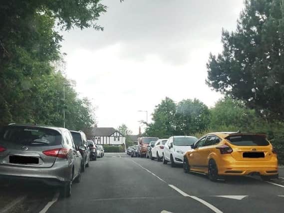 Cars parked on the road are causing anger among residents