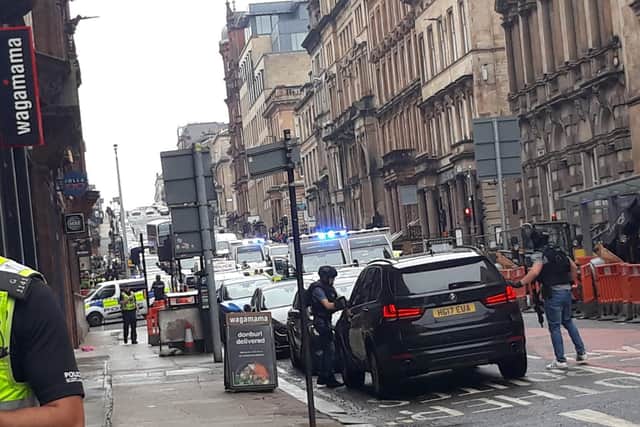 Photo taken with permission from the Twitter feed of @JATV_scotland of police presence in West George Street, Glasgow, as a serious police incident has closed roads in the city centre. PA Photo.