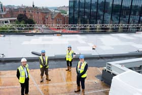 Celebrating on top of the Student Centre