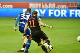 Kai Naismith fires homes Wigan's third