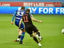 Kai Naismith fires homes Wigan's third