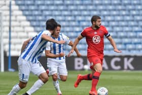 Captain Sam Morsy in action against Huddersfield.