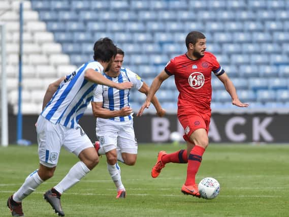 Captain Sam Morsy in action against Huddersfield.