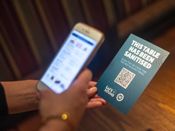 A QR code opens a digital restaurant menu to replace a hard copy