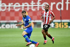 Wigan captain Sam Morsy in the thick of the action