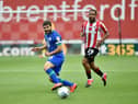Wigan captain Sam Morsy in the thick of the action