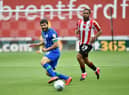 Wigan captain Sam Morsy in the thick of the action