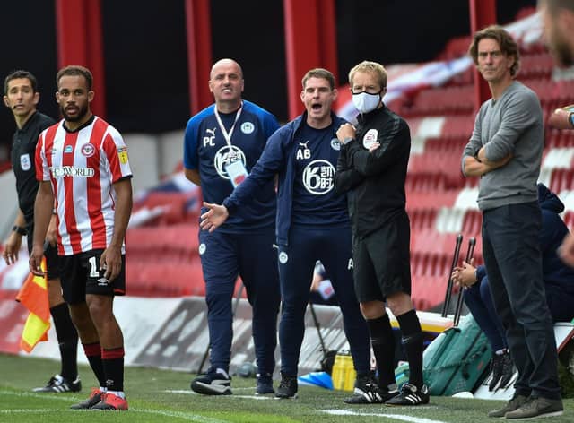 Brentford manager Thomas Frank, right, and Wigan counterpart Paul Cook