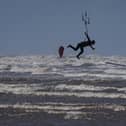 Up and away: Kitesurfers in St Annes today