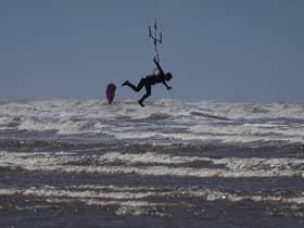 Up and away: Kitesurfers in St Annes today