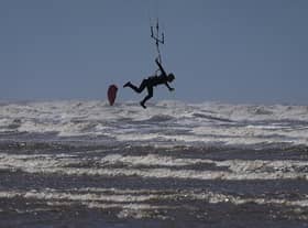 Up and away: Kitesurfers in St Annes today