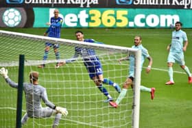 Kieffer Moore blasts home to give Wigan the lead