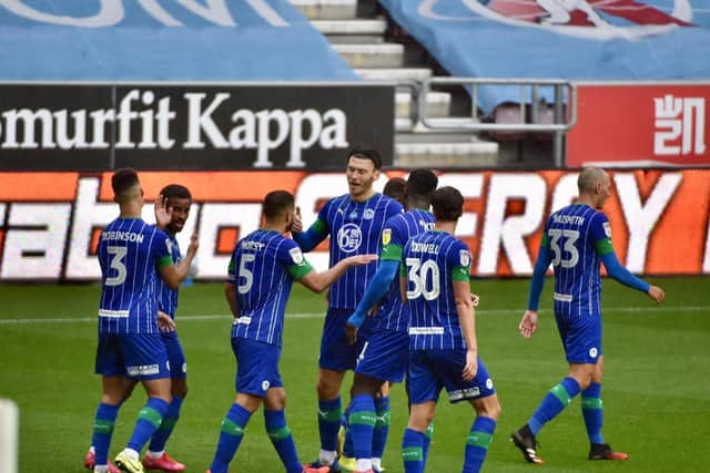 The Latics celebrate Kieffer Moore's goal