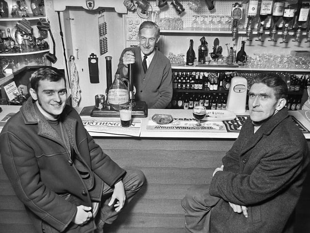 Tontine's Delph Tavern landlord, John Curtis, with customers, Tony Wilkinson and Thomas Glover, in March 1972.