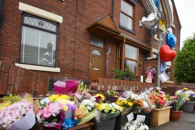 Flowers left in memory of 13-year-old Jack Worwood, who died following a hit and run on Old Road, Ashton-in-Makerfield.