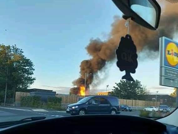 The fire in Golborne seen from a car in the area