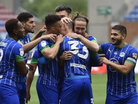 The Latics side celebrate another goal against Hull