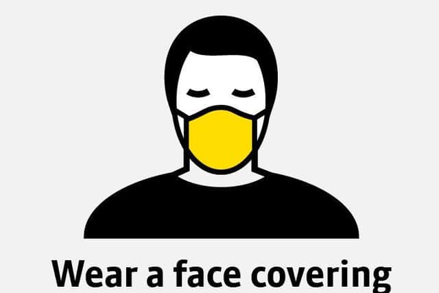 "Wear a face covering" warns TFGM