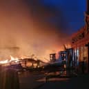A fire broke out on Blackpool's Central Pier at 3.20am on Friday, July 17, 2020. The blaze, which threatened to engulf the 150-year-old attraction, started in a workshop before spreading to the waltzers and Crazy Frog ride (Picture: South Shore Fire Station/Twitter/Lancashire Fire and Rescue Service)