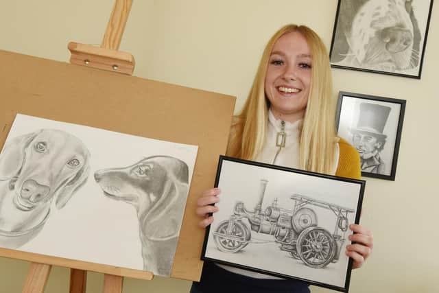 Gidlow artist Hannah with some of her work in her studio