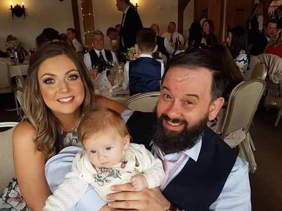 Darren Adams with his fiancee Kimberley Roberts and their daughter Alice