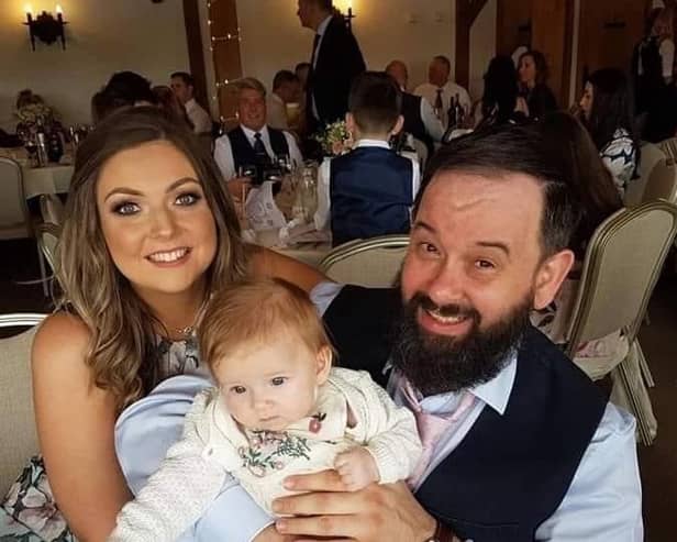 Darren Adams with his fiancee Kimberley Roberts and their daughter Alice