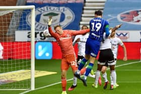 Kieffer Moore heads Wigan into the lead