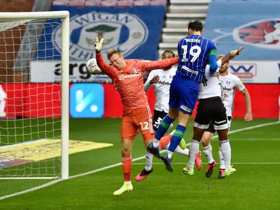 Kieffer Moore heads Wigan into the lead