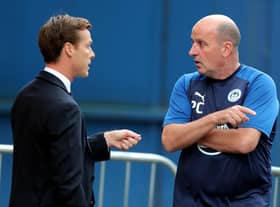 Scott Parker chats with Paul Cook, right, before the game