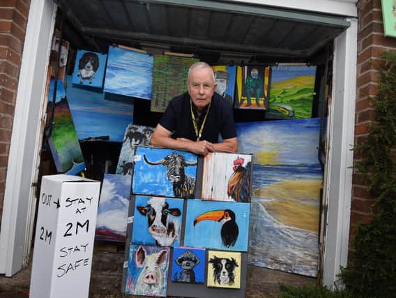 Artist David Hoult with some of the works he has produced during lockdown